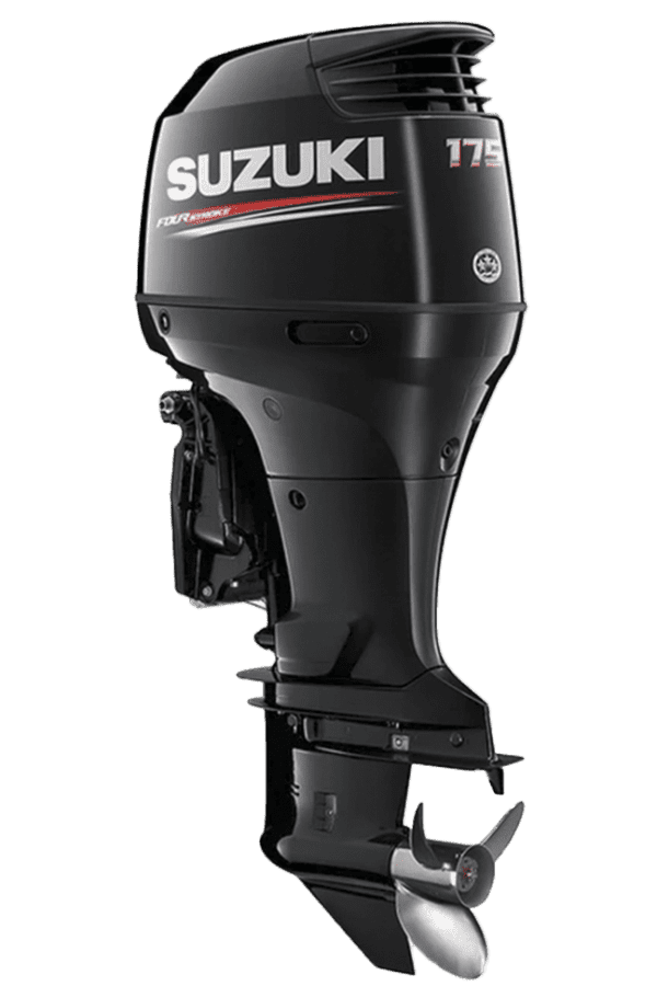 A black suzuki outboard motor sitting on top of a green background.